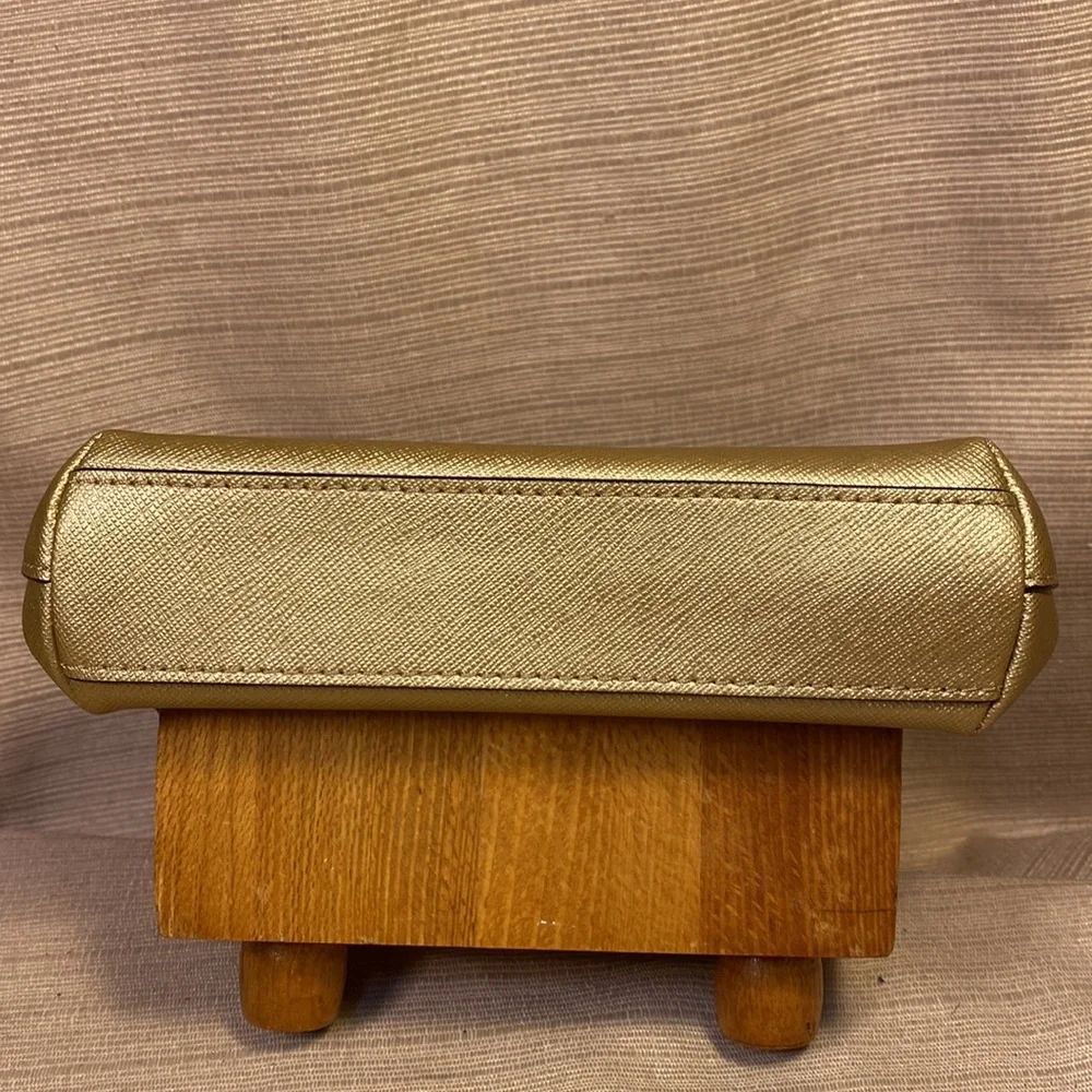 Coach gold metallic color cosmetic pouch w/elegant bow